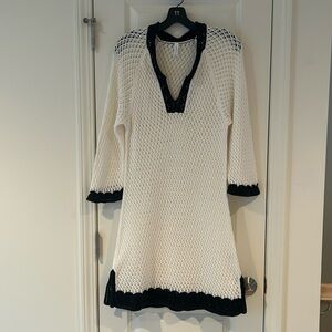 Knit beach cover up, beige trimmed in black.